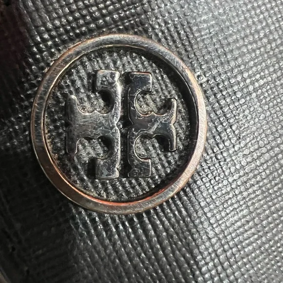 Tory Burch black large wallet with many compartments.